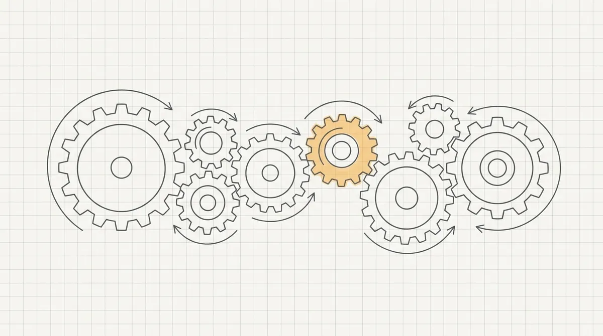 Line drawing of a row of gears of different sizes turning together